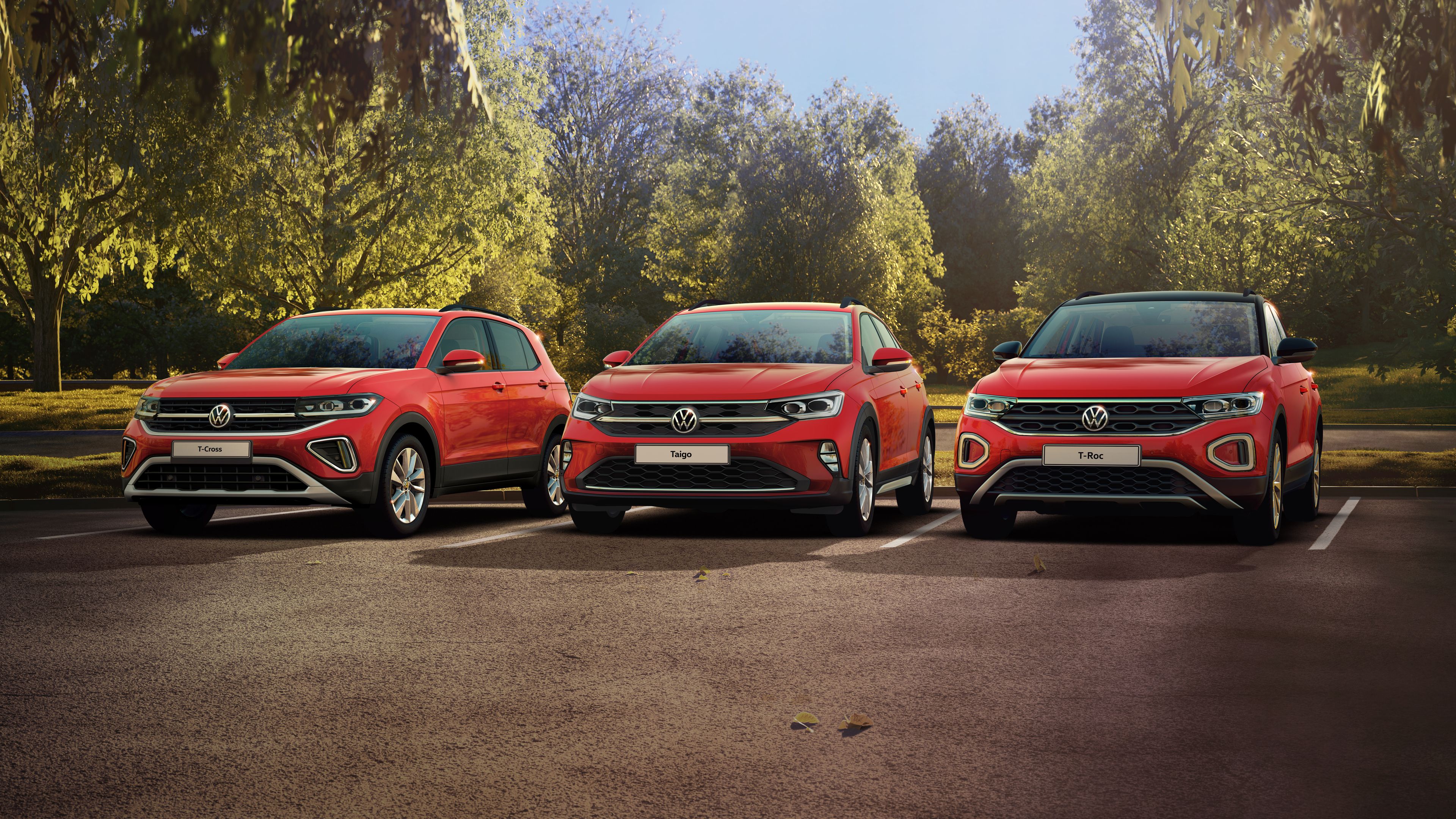 Piros VW modellek fás környezetben