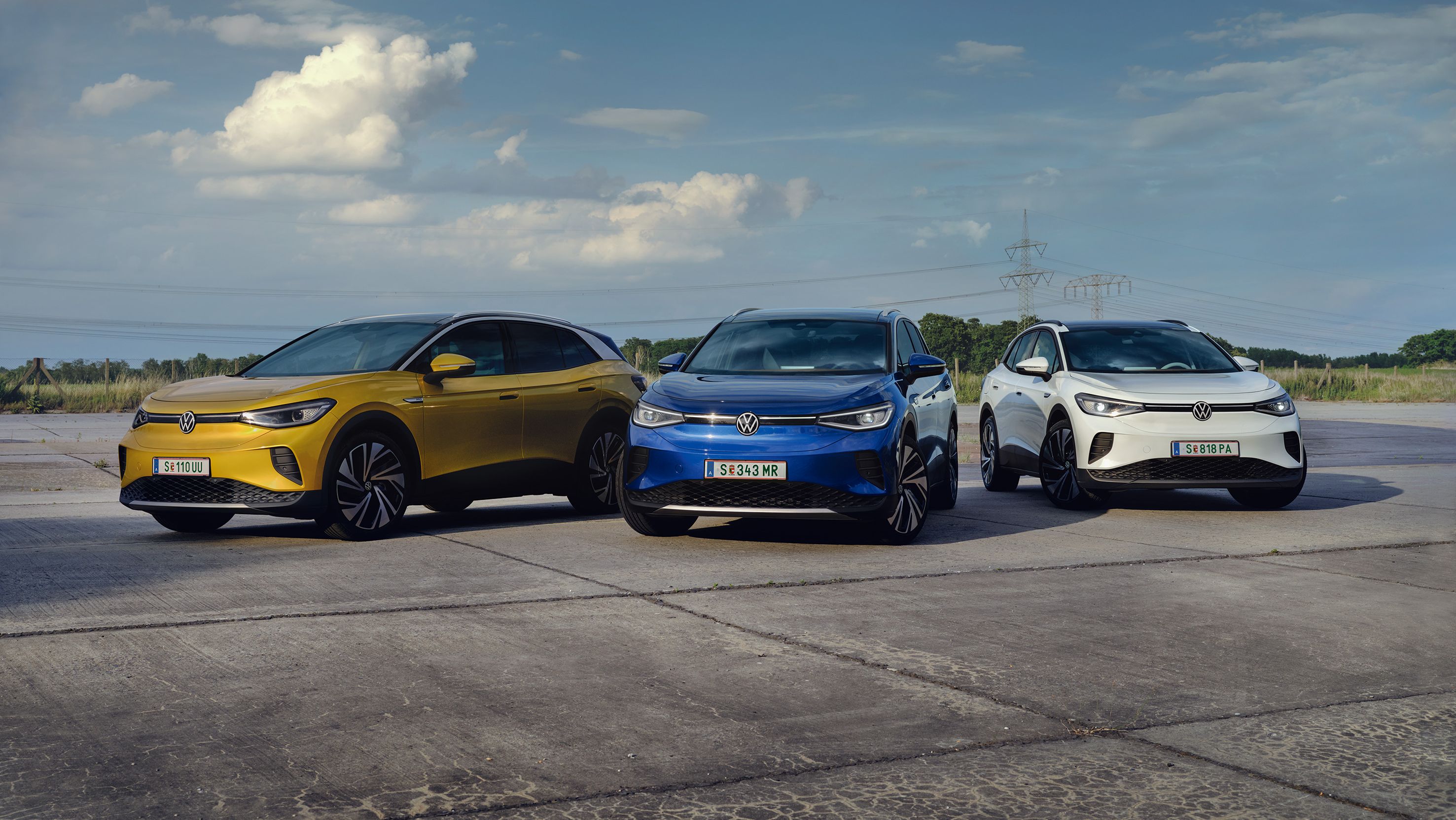 VW ID.4 Range in gelb, blau und weiß